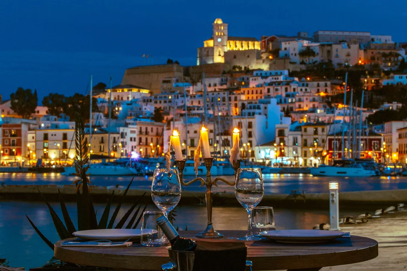 El Nautico Candlelit table at El Náutico overlooking Ibiza’s harbour and illuminated Dalt Vila